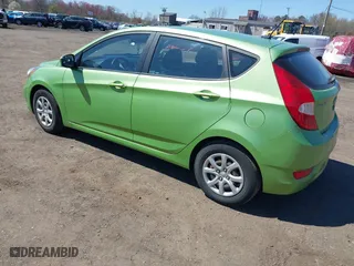 2014 Hyundai Accent GS with VIN KMHCT5AE0EU193502, listed as a IAAI auction lot 42036656 with 114,136 mi miles. Bid and sale history available at carsss.com. Image 3.