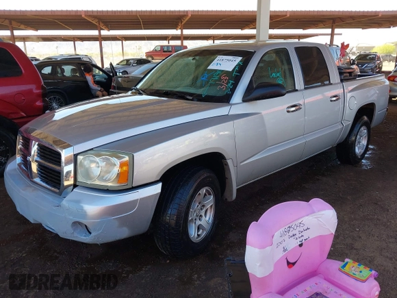 2007 Dodge Dakota SLT with VIN 1D7HE48N57S171908, listed as a IAAI auction lot 41875045 with 245,148 mi miles and . Bid and sale history available at carsss.com. Image 2.