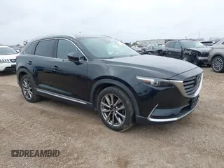 2016 Mazda CX-9 Signature with VIN JM3TCBEY7G0121561, listed as a IAAI auction lot 41340829 with 96,025 mi miles and . Bid and sale history available at carsss.com. Image 1.