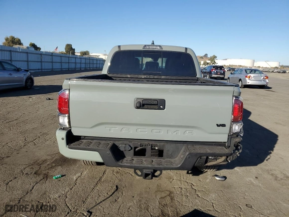 2022 Toyota Tacoma 4WD SR with VIN 3TMCZ5AN5NM531029, listed as a Copart auction lot 77404554 with 26,177 mi miles and Salvage Title. Bid and sale history available at carsss.com. Image 6.