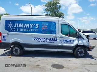 2023 Ford Transit Cargo with VIN 1FTBR1C82PKA26720, listed as a IAAI auction lot 39437379 with Not provided miles and . Bid and sale history available at DreamBid. Image 14.