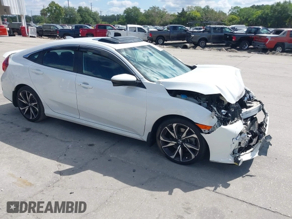 2018 Honda Civic Si with VIN 2HGFC1E53JH700251, listed as a IAAI auction lot 42043732 with 104,763 mi miles and . Bid and sale history available at DreamBid. Image 1.
