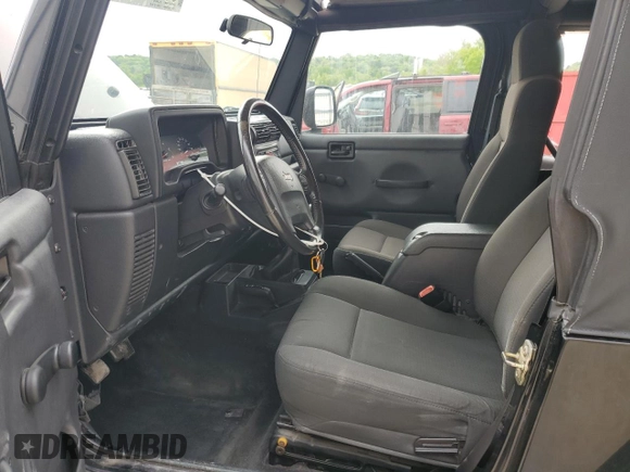 2006 Jeep Wrangler X with VIN 1J4FA39SX6P719070, listed as a Copart auction lot 55598455 with 110,741 mi miles and Salvage title. Bid and sale history available at DreamBid. Image 7.