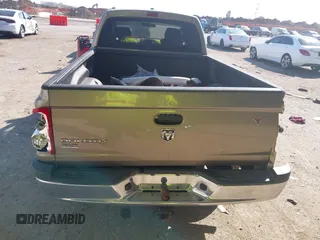 2006 Dodge Dakota SLT with VIN 1D7HE42K16S666071, listed as a IAAI auction lot 41676231 with 129,977 mi miles and . Bid and sale history available at carsss.com. Image 16.