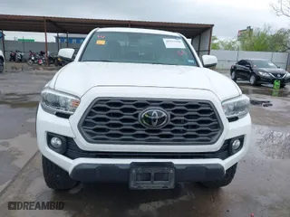 2021 Toyota Tacoma 4WD SR with VIN 5TFCZ5AN3MX265793, listed as a IAAI auction lot 41953190 with 94,648 mi miles. Bid and sale history available at carsss.com. Image 12.