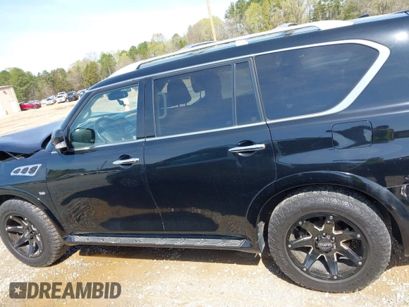 2014 Infiniti QX80 z VIN JN8AZ2NFXE9554706, wystawiony jako IAAI lot #41930947 z przebiegiem 133 655 mil mil oraz . Historia ofert i sprzedaży dostępna na DreamBid. Obrazek 14.