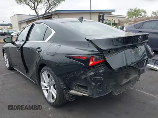 2021 Lexus IS 300 with VIN JTHAA1D29M5111530, listed as a IAAI auction lot 42203528 with 76,996 mi miles and . Bid and sale history available at DreamBid. Image 3.