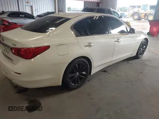 2015 Infiniti Q50 with VIN JN1BV7AP0FM347685, listed as a IAAI auction lot 42690285 with 126,957 mi miles and . Bid and sale history available at DreamBid. Image 4.