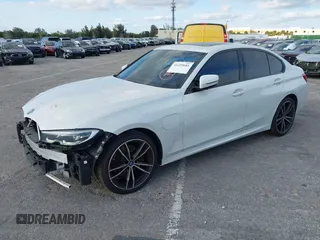 2022 BMW 3 Series 330e with VIN 3MW5P7J08N8C65252, listed as a IAAI auction lot 41229681 with 27,606 mi miles. Bid and sale history available at carsss.com. Image 2.