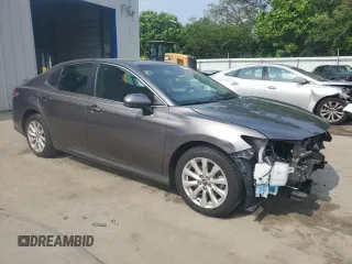 2018 Toyota Camry LE с VIN 4T1B11HK1JU118582, выставлен на аукционе Copart как лот 57972895 с пробегом 39 776 миль миль и Списание • Salvage title. История ставок и продаж доступна на DreamBid. Изображение 4.