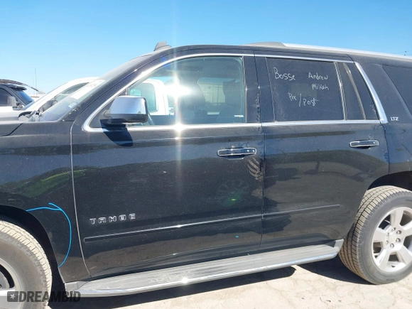 2015 Chevrolet Tahoe LTZ with VIN 1GNSCCKCXFR117525, listed as a IAAI auction lot 41839259 with 143,413 mi miles. Bid and sale history available at carsss.com. Image 15.