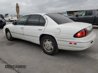 1997 Chevrolet Lumina LS with VIN 2G1WL52M5V9107095, listed as a Copart auction lot 73659954 with 135,669 mi miles and Salvage Title. Bid and sale history available at DreamBid. Image 2.