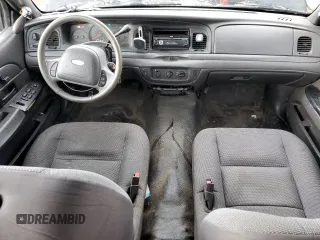 2004 Ford Police Interceptor with VIN 2FAHP71W14X138220, listed as a Copart auction lot 59930385 with 169,302 mi miles and Salvage title. Bid and sale history available at DreamBid. Image 8.