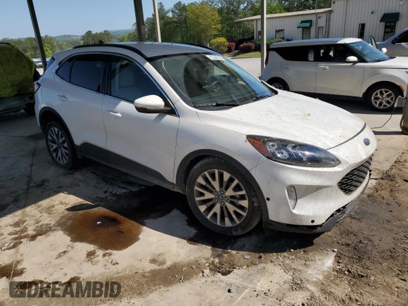 2020 Ford Escape Titanium с VIN 1FMCU9J93LUB38014, выставлен на аукционе Copart как лот 52348725 с пробегом 78 193 миль миль и Списание • Salvage title. История ставок и продаж доступна на DreamBid. Изображение 4.