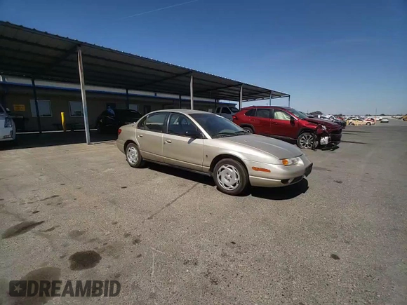 2000 Saturn SL with VIN 1G8ZK5274YZ103237, listed as a Copart auction lot 60558105 with 126,320 mi miles and Salvage title. Bid and sale history available at DreamBid. Image 14.