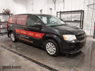 2014 Ram Cargo Van with VIN 2C4RRGAG3ER327586, listed as a IAAI auction lot 41478683 with 146,178 mi miles. Bid and sale history available at carsss.com. Image 1.