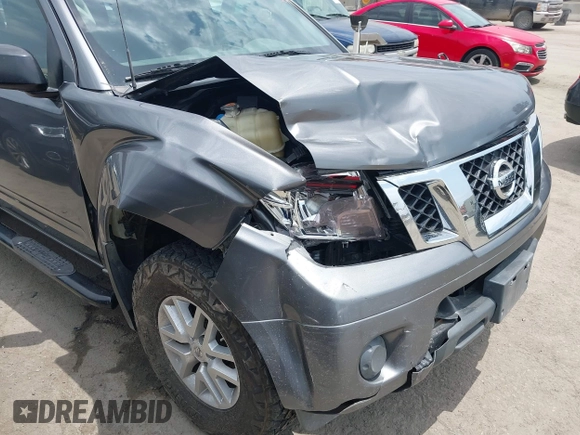 2019 Nissan Frontier SV with VIN 1N6AD0EV2KN723588, listed as a IAAI auction lot 42405233 with 79,310 mi miles and . Bid and sale history available at DreamBid. Image 6.