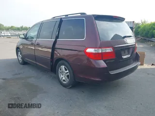 2007 Honda Odyssey EX-L with VIN 5FNRL387X7B140635, listed as a IAAI auction lot 42036807 with 292,774 mi miles. Bid and sale history available at carsss.com. Image 3.