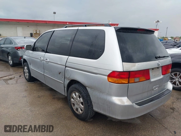 2004 Honda Odyssey EX with VIN 5FNRL18694B076305, listed as a IAAI auction lot 41929212 with 287,717 mi miles and . Bid and sale history available at DreamBid. Image 3.