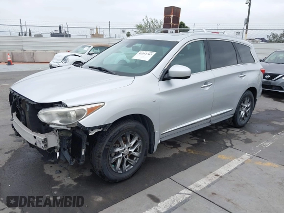 2014 Infiniti QX60 with VIN 5N1AL0MM7EC500070, listed as a IAAI auction lot 42544763 with 189,419 mi miles and . Bid and sale history available at DreamBid. Image 2.