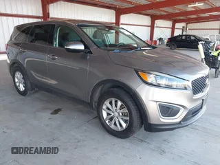 2018 Kia Sorento LX with VIN 5XYPG4A39JG417378, listed as a IAAI auction lot 41671284 with 216,876 mi miles. Bid and sale history available at carsss.com. Image 1.