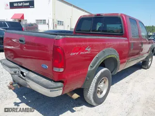 1999 Ford Super Duty F-250 XL with VIN 1FTNX21S2XEA61120, listed as a IAAI auction lot 42046522 with 1,658,775 mi miles. Bid and sale history available at carsss.com. Image 4.