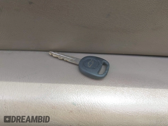 2004 Chevrolet Tahoe LT with VIN 1GNEC13ZX4J232416, listed as a IAAI auction lot 42125559 with 407,838 mi miles and . Bid and sale history available at DreamBid. Image 11.