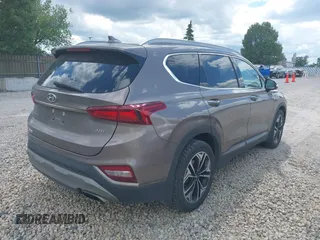 2020 Hyundai Santa Fe Limited with VIN 5NMS53AA5LH191809, listed as a IAAI auction lot 39804008 with 115,775 mi miles and . Bid and sale history available at DreamBid. Image 4.