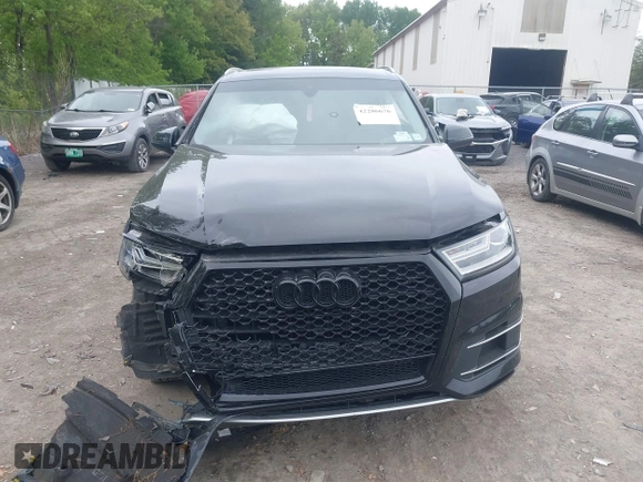 2018 Audi Q7 Premium Plus z VIN WA1LHAF7XJD049338, wystawiony jako IAAI lot #42286676 z przebiegiem 103 462 mil mil oraz . Historia ofert i sprzedaży dostępna na DreamBid. Obrazek 6.