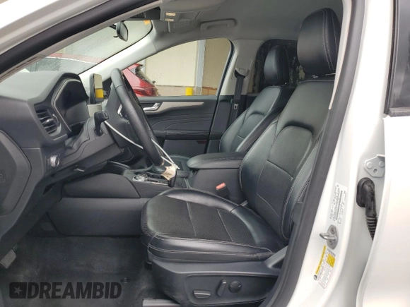 2021 Ford Escape SEL z VIN 1FMCU9H64MUA51011, wystawiony jako Copart lot #58241615 z przebiegiem 100 075 mil mil oraz Czysty tytuł • Clean title. Historia ofert i sprzedaży dostępna na DreamBid. Obrazek 7.