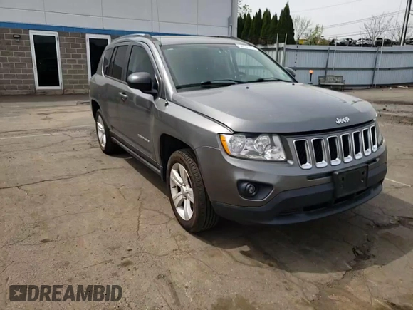 2012 Jeep Compass Latitude with VIN 1C4NJDEB0CD621109, listed as a Copart auction lot 54737735 with 73,323 mi miles and Salvage Title. Bid and sale history available at DreamBid. Image 14.