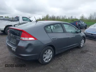 2010 Honda Insight LX with VIN JHMZE2H55AS041684, listed as a IAAI auction lot 42222564 with 296,830 mi miles and . Bid and sale history available at DreamBid. Image 4.