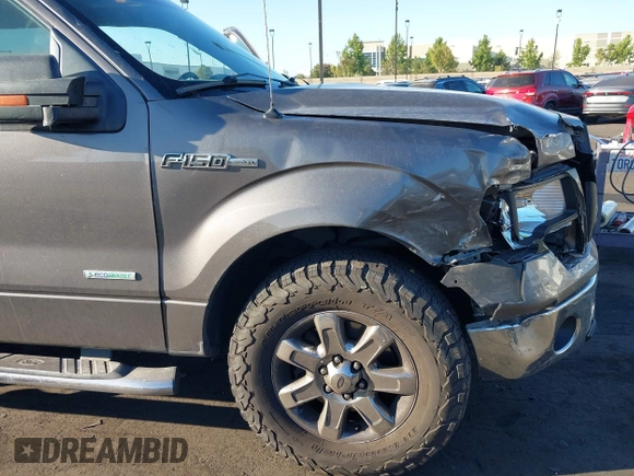 2014 Ford F-150 XL z VIN 1FTFW1CT0EFB69945, wystawiony jako IAAI lot #42507421 z przebiegiem 141 167 mil mil oraz . Historia ofert i sprzedaży dostępna na DreamBid. Obrazek 12.
