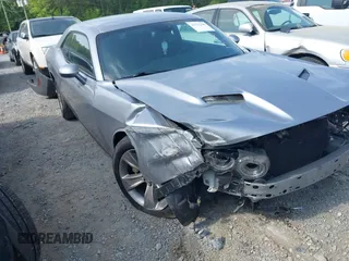 2016 Dodge Challenger SXT Plus z VIN 2C3CDZAG3GH153080, wystawiony jako IAAI lot #42175199 z przebiegiem 244 343 mil mil oraz . Historia ofert i sprzedaży dostępna na DreamBid. Obrazek 1.