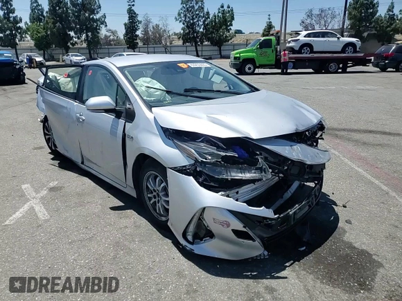 2021 Toyota Prius LE z VIN JTDKAMFPXM3169514, wystawiony jako Copart lot #63255095 z przebiegiem 49 546 mil mil oraz Szkoda całkowita • Salvage title. Historia ofert i sprzedaży dostępna na DreamBid. Obrazek 13.
