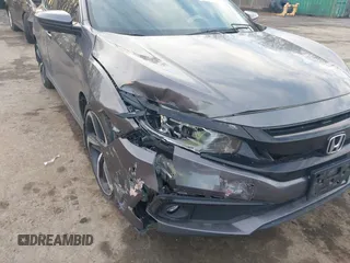 2019 Honda Civic Sport with VIN 2HGFC2F8XKH503867, listed as a IAAI auction lot 41533506 with 66,650 mi miles and . Bid and sale history available at DreamBid. Image 6.