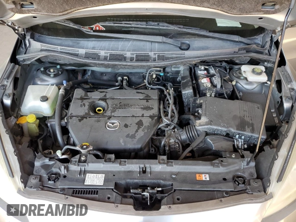 2012 Mazda 5 Sport with VIN JM1CW2BL6C0115463, listed as a Copart auction lot 44831504 with 90,207 mi miles and Salvage Title. Bid and sale history available at DreamBid. Image 12.