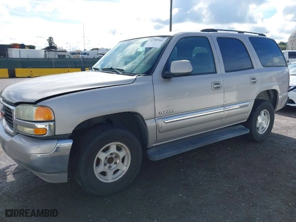 2004 GMC Yukon SLT with VIN 1GKEC13V74J311617, listed as a IAAI auction lot 41785561 with 225,245 mi miles. Bid and sale history available at carsss.com. Image 2.