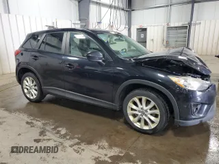 2014 Mazda CX-5 Grand Touring with VIN JM3KE4DY0E0322606, listed as a Copart auction lot 54381815 with 216,022 mi miles and Salvage Title. Bid and sale history available at DreamBid. Image 4.