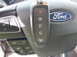 2016 Ford Focus Titanium with VIN 1FADP3J22GL314021, listed as a IAAI auction lot 42212462 with 142,370 mi miles and . Bid and sale history available at DreamBid. Image 11.