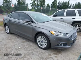 2014 Ford Fusion SE Hybrid with VIN 3FA6P0LU6ER285188, listed as a IAAI auction lot 42516215 with 122,899 mi miles and . Bid and sale history available at DreamBid. Image 1.