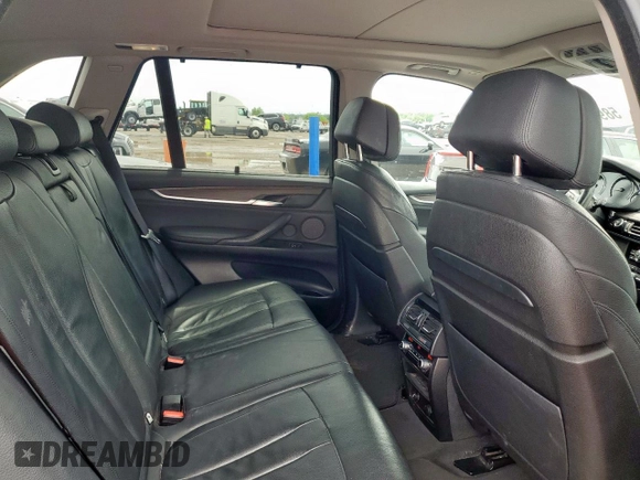 2014 BMW X5 xDrive35i z VIN 5UXKR0C5XE0K51331, wystawiony jako Copart lot #58962465 z przebiegiem 85 910 mil mil oraz Czysty tytuł • Clean title. Historia ofert i sprzedaży dostępna na DreamBid. Obrazek 10.