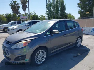 2013 Ford C-Max SEL z VIN 1FADP5CU3DL556211, wystawiony jako IAAI lot #42413793 z przebiegiem Nie podano mil oraz . Historia ofert i sprzedaży dostępna na DreamBid. Obrazek 6.