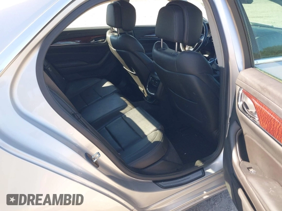 2014 Cadillac CTS Luxury AWD with VIN 1G6AX5S34E0124464, listed as a IAAI auction lot 42298607 with 89,351 mi miles and . Bid and sale history available at DreamBid. Image 8.