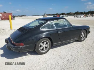 1975 Porsche 911 with VIN 9115202267, listed as a Copart auction lot 75863884 with 61,298 mi miles and Salvage title. Bid and sale history available at DreamBid. Image 3.