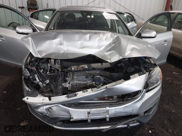 2016 Volvo S60 T5 Drive-E Premier z VIN YV126MFKXG1395519, wystawiony jako IAAI lot #41488969 z przebiegiem 109 130 mil mil oraz . Historia ofert i sprzedaży dostępna na DreamBid. Obrazek 6.