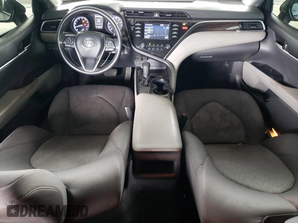 2018 Toyota Camry LE z VIN JTNB11HK8J3025709, wystawiony jako Copart lot #56763315 z przebiegiem 157 941 mil mil oraz Szkoda całkowita • Salvage title. Historia ofert i sprzedaży dostępna na DreamBid. Obrazek 8.