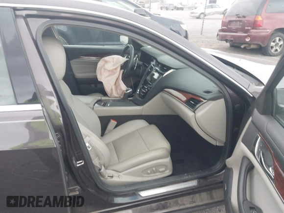 2014 Cadillac CTS Luxury RWD z VIN 1G6AR5S3XE0192441, wystawiony jako IAAI lot #41707095 z przebiegiem 205 904 mil mil oraz . Historia ofert i sprzedaży dostępna na DreamBid. Obrazek 5.