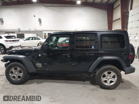 2019 Jeep Wrangler Unlimited Sport Altitude with VIN 1C4HJXDGXKW505396, listed as a IAAI auction lot 42039985 with 146,178 mi miles and . Bid and sale history available at DreamBid. Image 14.