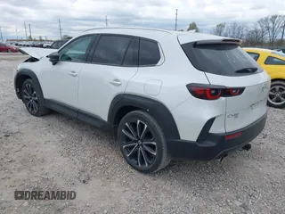 2023 Mazda CX-50 S Premium Plus with VIN 7MMVABEM7PN108865, listed as a IAAI auction lot 42049215 with 33,285 mi miles and . Bid and sale history available at DreamBid. Image 3.